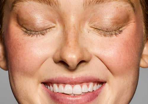 Model with eyes closed wearing Hella Extra Mascara Primer. Model with eyes closed wearing Hella Extra Mascara Primer.