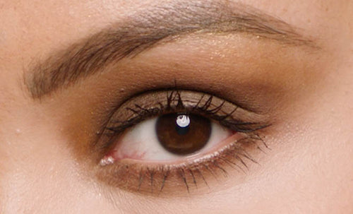 Macro shot of model wearing Shadowstix Longwear Eyeshadow Sticks collection and Hella Thicc Mascara. Macro shot of model wearing Shadowstix Longwear Eyeshadow Sticks collection and Hella Thicc Mascara.