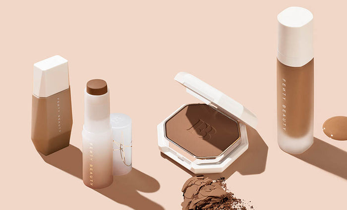 Complexion product shot with swatches of Eaze Drop Skin Tint, Eaze Drop Skin Tint Stick, Pro Filter Powder Foundation, Pro Filter Soft Matte Liquid Foundation. Complexion product shot with swatches of Eaze Drop Skin Tint, Eaze Drop Skin Tint Stick, Pro Filter Powder Foundation, Pro Filter Soft Matte Liquid Foundation.