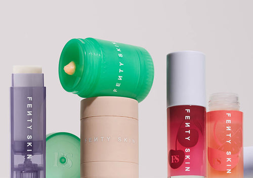 Product shots of Fenty Skin lipcare line: Lux Balm Lip Balm, Plush Puddin' Lip Mask, Fenty Treatz Lip Oil. Product shots of Fenty Skin lipcare line: Lux Balm Lip Balm, Plush Puddin' Lip Mask, Fenty Treatz Lip Oil.