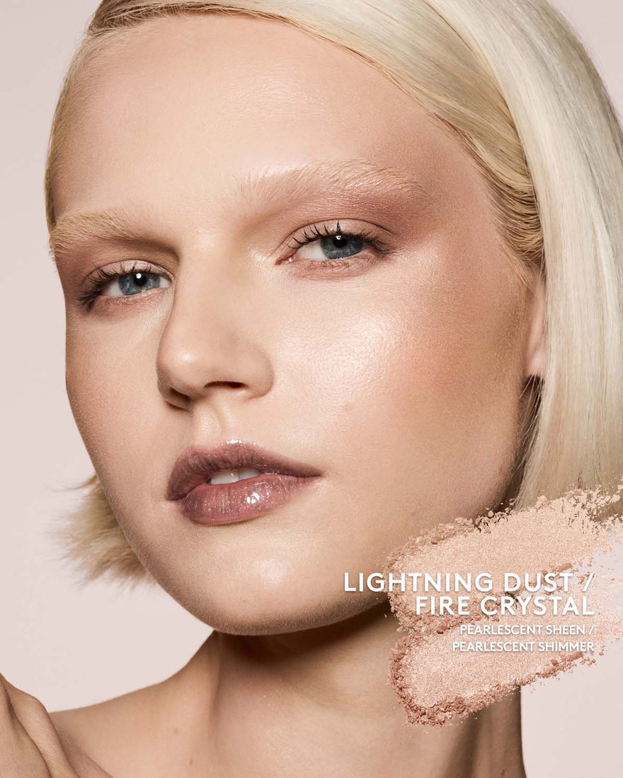 light skin toned model wearing killawatt freestyle highlighter in shade lightning dust/fire crystal