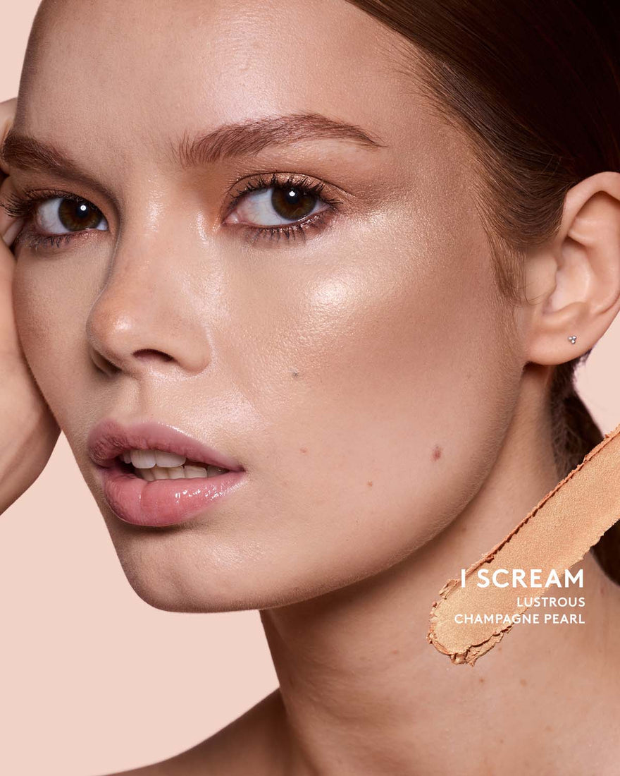 Light-medium skin toned model wearing match stix shimmer in shade I Scream.