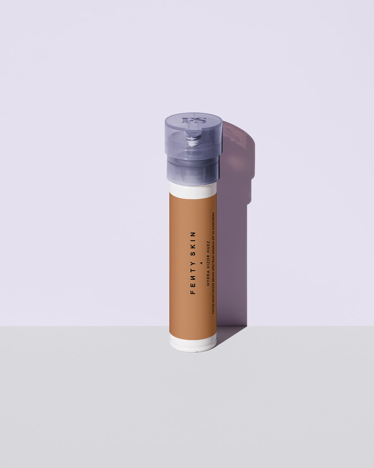 Hydra Vizor Hues tinted moisturizer sunscreen refill in shade 4 against a lavender background.